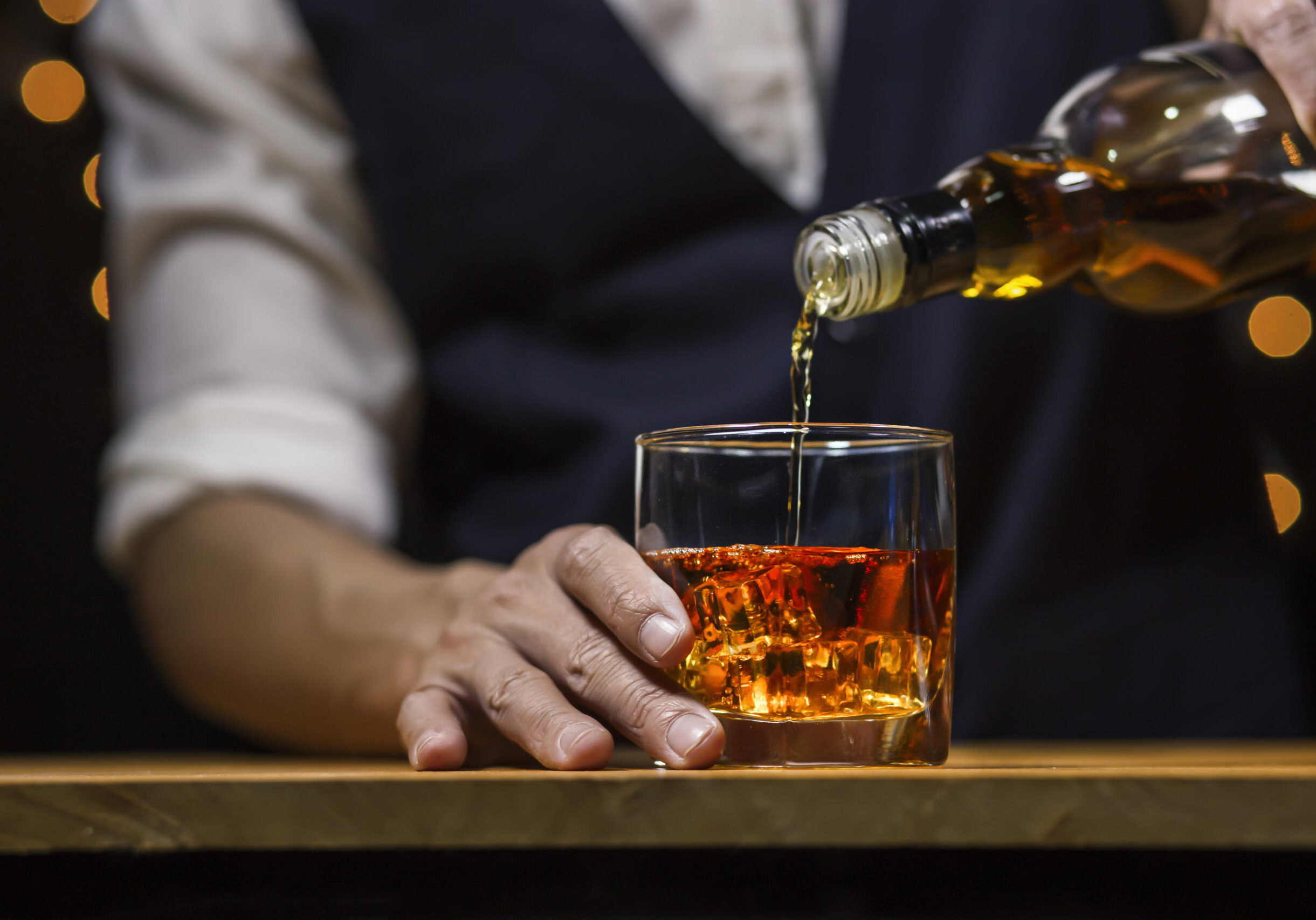 Bartender Serve Whiskey, on wood bar,